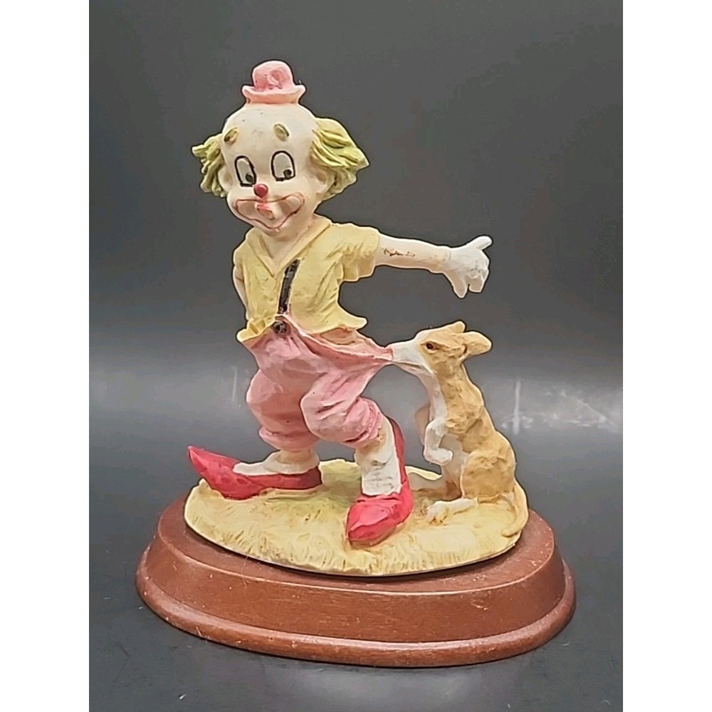 VTG Clown Figurine W/ Dog Pulling On Pants On Wood Stand By Leonardo 4.75" X 4"